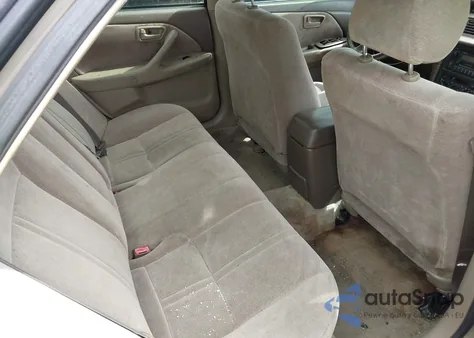 1999 Toyota Camry Le z USA, uszkodzony, nr VIN 4T1BG22K0XU593209